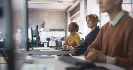 Aufkleber - Portrait of a Young Inspired Black Female Student Studying in College with Diverse Classmates. African Girl Asking Teacher a Question. Girl Using Computer to Acquire IT Skills in Class