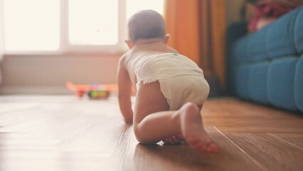 baby son crawling. happy family a first steps kid dream concept. baby newborn crawling down the hall