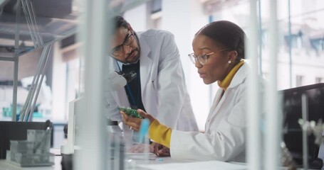 Fototapete - African Girl Having a Conversation with a Team Leader in a Science Experiment Laboratory, While Working on an Advanced Circuit Board Project. Scientist Explaining the Assignment to a Young Intern