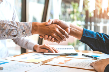 Aufkleber - Business people colleagues shaking hands during a meeting to sign agreement for New Partner Planning Strategy Analysis Concept