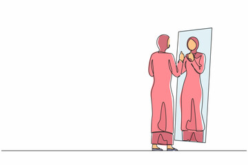 Poster - Single continuous line drawing Arab businesswoman loves to look at her reflection in mirror with thumbs up pose. Woman in mirror, egoistic, attractive confidence. One line draw graphic design vector