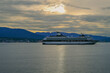 Luxury cruiseship cruise ship liner Century arrival sail into port of Vancouver, BC Canada from Alaska Last Frontier adventure cruising during sunrise with beautiful scenic view