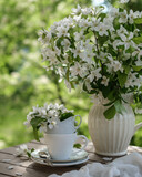 Fototapeta Nowy Jork - Still life with white flowers in the garden. Summer still life