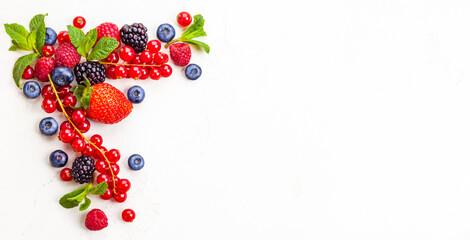 Wall Mural - Sweet summer harvest of ripe berries on white background. Top view, copy space.