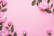 Pink flowers with green leaves on a pink background