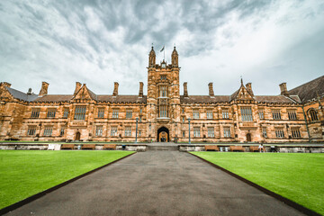 Wall Mural - The facade of the historical University of Sydney Quadrangle in cloudy days