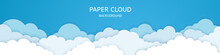 Clouds On Blue Sky Background. White Clouds Against The Blue Sky. Paper Clouds With Shadow.