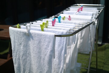 Drying a white towel in the sun