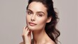 Leinwandbild Motiv Portrait of woman, skincare and beauty cosmetics for shine, wellness or healthy glow on studio background. Happy model touching face after facial laser aesthetics, chemical peel and clean dermatology.