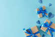 © Goncharuk film - Surprise your dad with stylish gift concept this Father's Day. Top view flat lay of gift boxes with bows and paper hearts on light blue background with empty space for greeting text or message