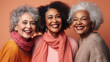 Three senior women with stylish grey hair are joyfully posing in a studio with a clear light pink background. Generative AI