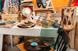 © New Africa - Many different stuff near orange wall indoors. Garage sale