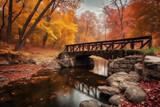 Fototapeta Krajobraz - The ancient bridge in the golden forest in autumn.