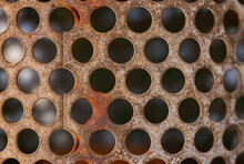 Close Up View Of Rusty Weathered Metal Tube Filter For Background Use.