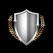 © backup16 - Silver shield with gold laurel wreath. Metal heraldic emblems vector illustration. Retro luxury elements with shining sparkles. Heraldry insignia, antique golden decor on black background