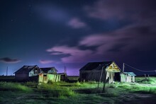 Deserted Farm At Night With Dilapidated Barns And Abandoned Crops, In Neon Colors