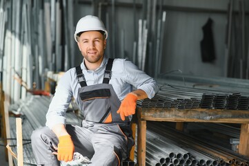 Wall Mural - Factory worker. Man working on the production line.