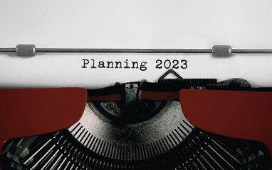 Poster - text planning 2023 typed on retro typewriter