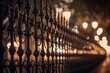 A striking black iron forged fence at night, captured with selective focus and bokeh blur, creating a mysterious and dramatic scene.