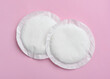 Top view of two disposable cotton nursing pads