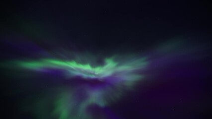Wall Mural - Colorful Northern Lights (Aurora Borealis) appear overhead on the night sky. Timelapse. 