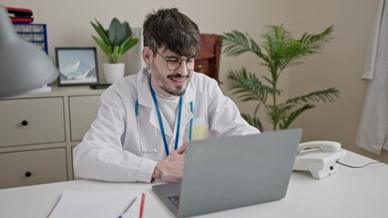 Poster - Young hispanic man doctor doing online appointment at clinic