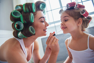 Wall Mural - Mom and daughter at home