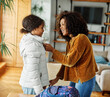 © Lumos sp - child mother family education school girl home daughter backpack help parent getting ready elementary teen morning hug love helping together black
