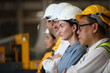 © sittinan - engineer team standing at industry