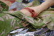A training mannequin that mimics the injuries soldiers may sustain in battle, enabling medics to practice their skills.