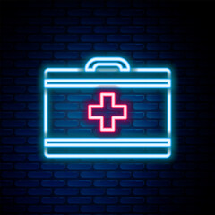 Wall Mural - Glowing neon line First aid kit icon isolated on brick wall background. Medical box with cross. Medical equipment for emergency. Healthcare concept. Colorful outline concept. Vector