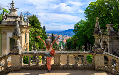 Wall Mural - woman tourist in portugal- sanctuary nossa senhora dos remedios in lamego- viseu distric