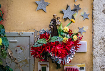 Wall Mural - Religious decoration on a house wall in Alfama neighborhood of Lisbon city, Portugal