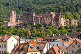 Fototapeta Miasto - Heidelberg Castle towers among the roof of the city. It is the most visited landmark of Heidelberg, Germany