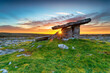 Sunset over Poulnabrone dolmen an ancient portal tomb in the Burren