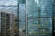 Dense standing buildings of Moscow City International Business Centre skyscrapers front view in the evening close up