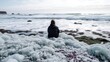 © Qulu - Person sitting in the ice plant by the ocean. generative ai