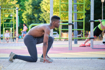 Wall Mural - Young fit shirtless black man ready to run outdoors on sunny summer day. Fitness and sport lifestyle.