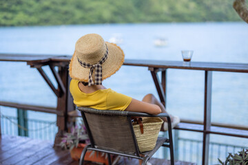 Wall Mural - Travel woman in outdoor coffee shop