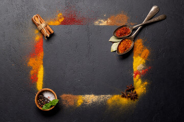 Poster - Various spices on stone table