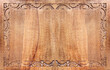 Horizontal background with wood carving floral ornament. Decorative carved border on wooden surface. Copy space for text