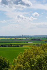 Wall Mural - Wind power plant among farm fields in Skåne Sweden during spring