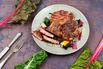 Wall Mural - Meat steak with green salad.