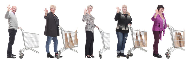 Wall Mural - group of people in profile with shopping cart isolated