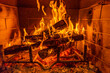 © Tetra Images - Close-up of fireplace burning wood