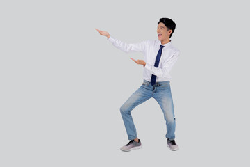 Sticker - Portrait young asian business man presenting isolated on white background, advertising and marketing, executive and manager, businessman confident showing success, expression and emotion.