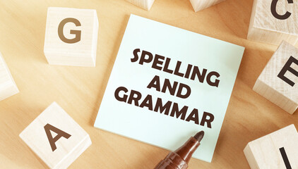 Poster - sticker with text spelling and grammar in the middle of wooden cubes with letters
