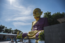 Chonburi.Thailand - 12.12.2022 Big Golden Luang Pu Thuad Statue On Koh Lan Island.Koh Lan Island Is The Famous Island Near Pattaya City Thailand Nual Beach