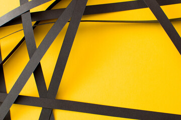 Wall Mural - Yellow background with black geometric stripes, copy space