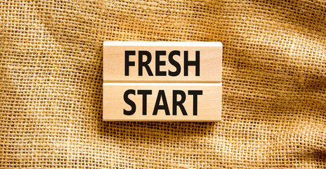 Wall Mural - Fresh start and motivational symbol. Concept words Fresh start on beautiful wooden block. Beautiful canvas table canvas background. Business motivational and Fresh start concept. Copy space.